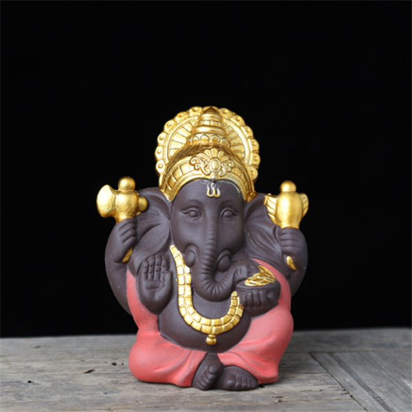 Gilded Ganesha Ceramic Figurine