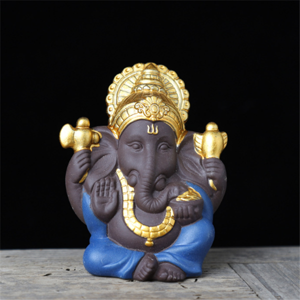 Gilded Ganesha Ceramic Figurine