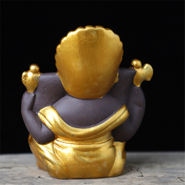 Gilded Ganesha Ceramic Figurine