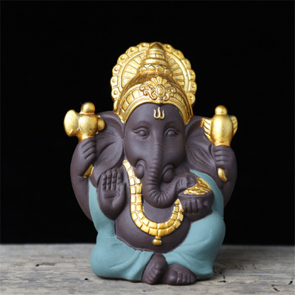 Gilded Ganesha Ceramic Figurine