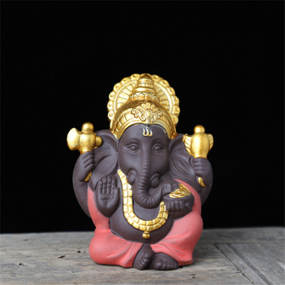 Gilded Ganesha Ceramic Figurine