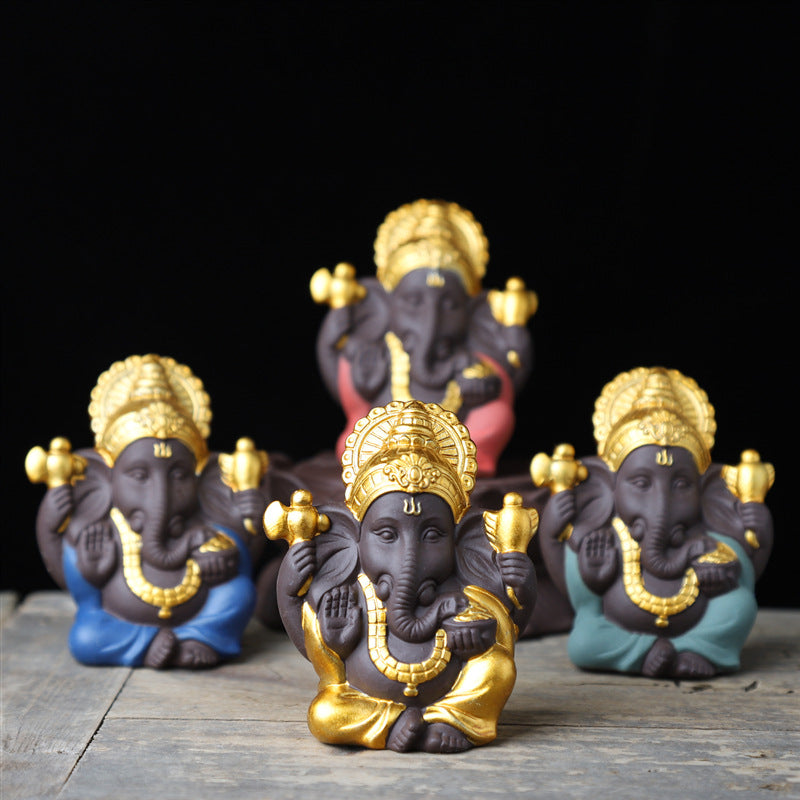 Gilded Ganesha Ceramic Figurine