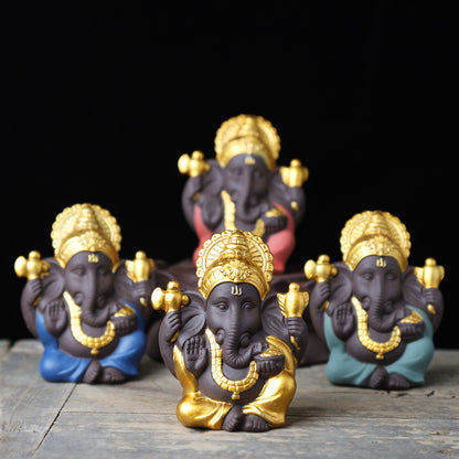 Gilded Ganesha Ceramic Figurine